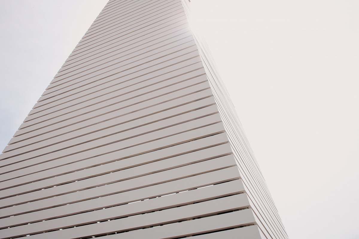grey white high-rise building during day seaside